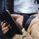 Side view of firefighter with clipboard